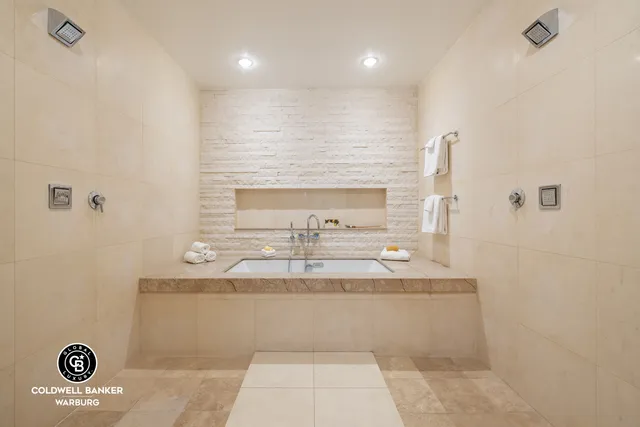 a bed room with a bed and a couch