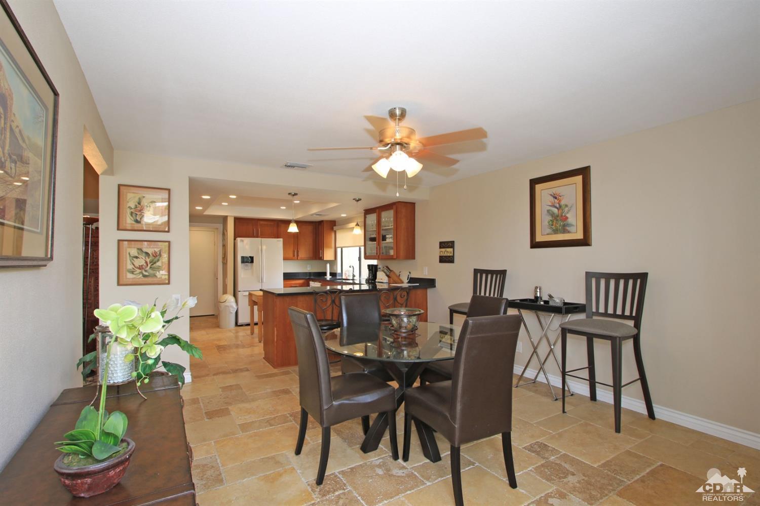72350 Rodeo Way Rancho Mirage, CA 92270 - Photo 13 of 44 a view of a dining room with furniture