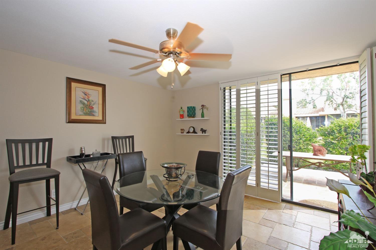 72350 Rodeo Way Rancho Mirage, CA 92270 - Photo 15 of 44 a view of a dining room with furniture window and outside view