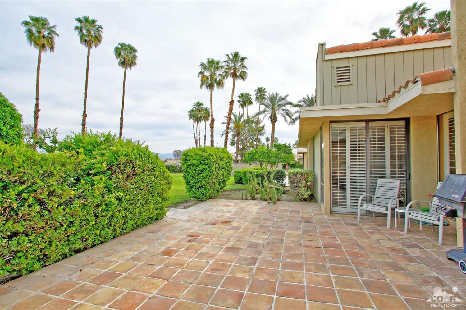 72350 Rodeo Way Rancho Mirage, CA 92270 - Photo 26 of 44 a front view of a house with garden