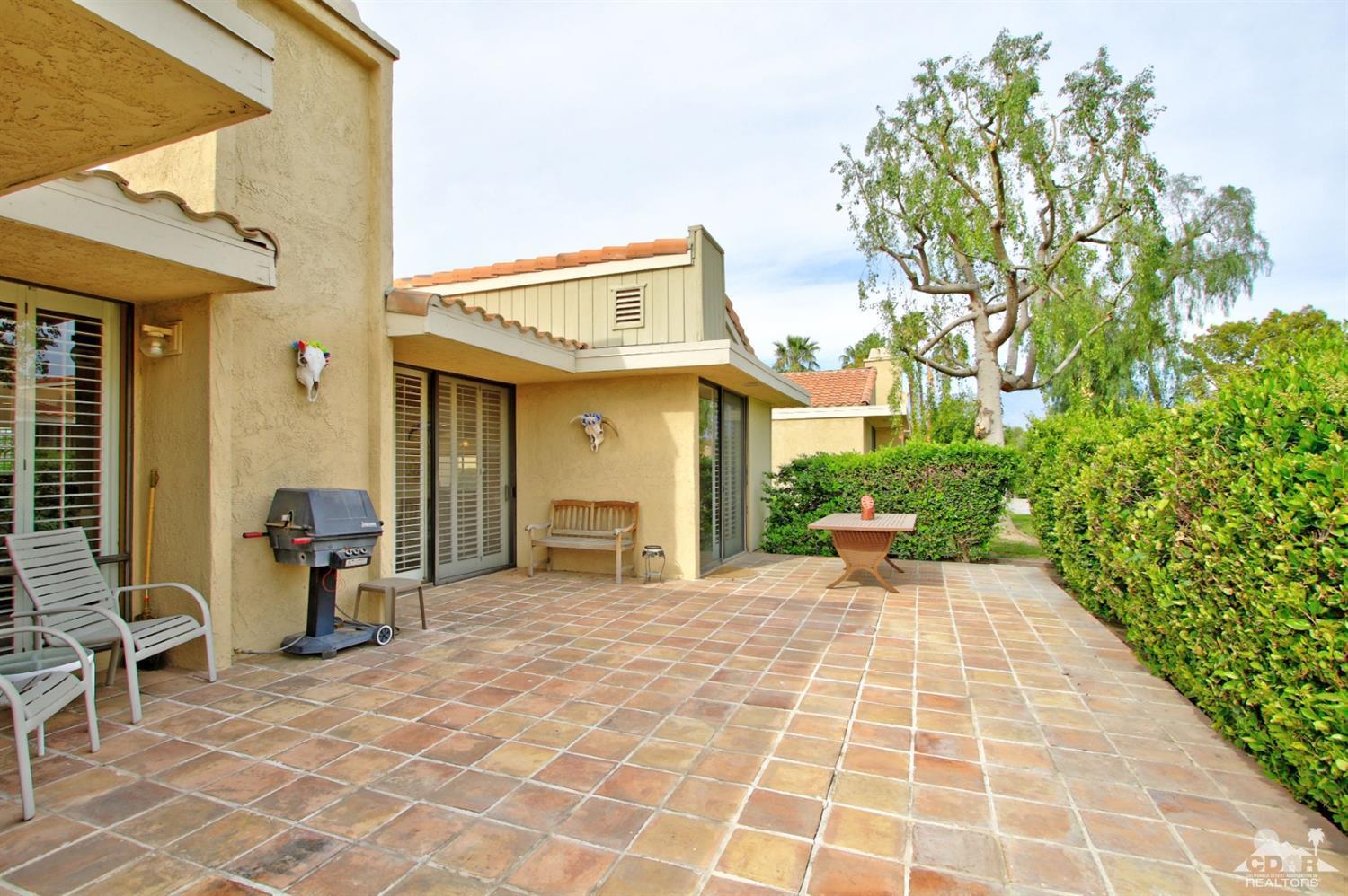 72350 Rodeo Way Rancho Mirage, CA 92270 - Photo 27 of 44 a view of a house with backyard porch and sitting area