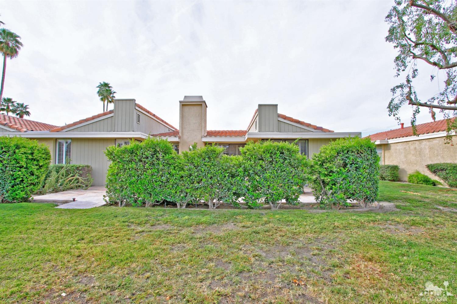 72350 Rodeo Way Rancho Mirage, CA 92270 - Photo 30 of 44 a front view of a house with garden