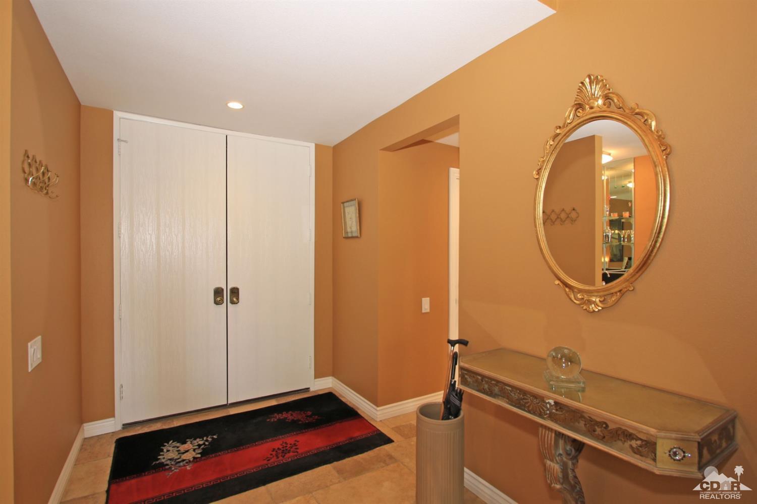 72350 Rodeo Way Rancho Mirage, CA 92270 - Photo 4 of 44 a room with furniture and wooden floor