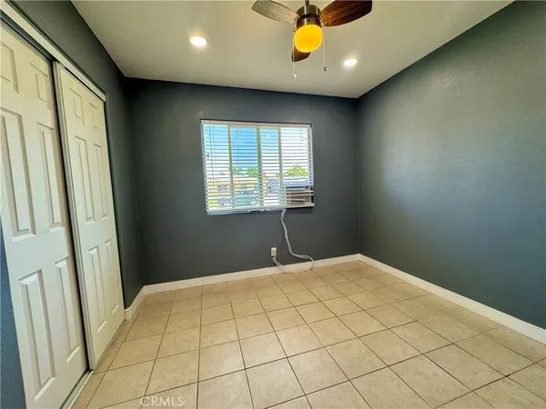 a view of an empty room and window