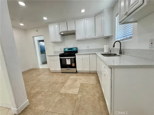 a kitchen with a stove
