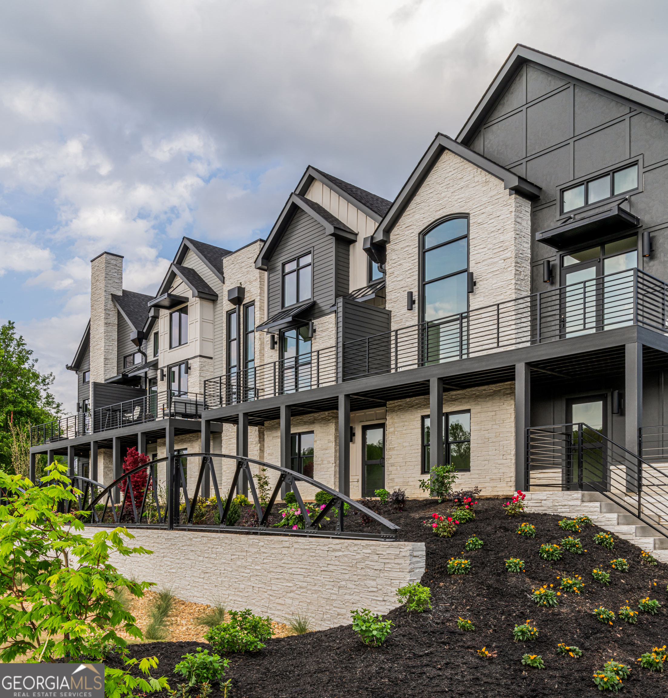 1281 East Main Street, Unit 3 Blue Ridge, GA 30513 - Photo 2 of 5 a front view of a house with a porch