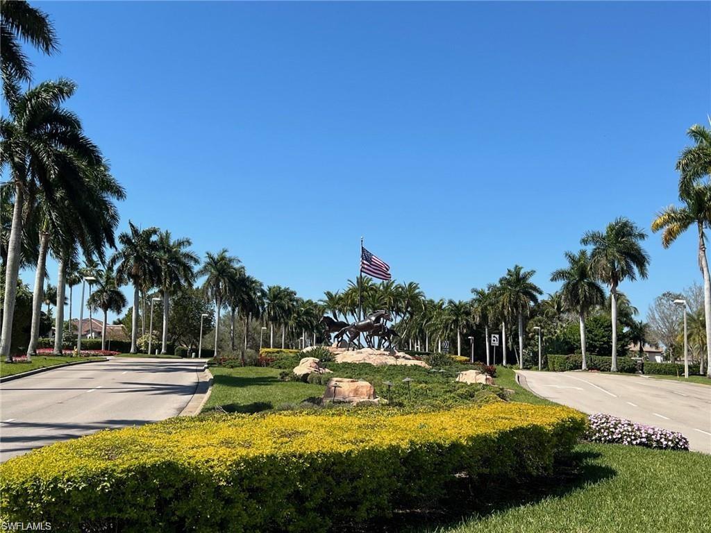 8967 Lely Island Circle Naples, FL 34113 - Photo 41 of 46 a view of a swimming pool with an outdoor space