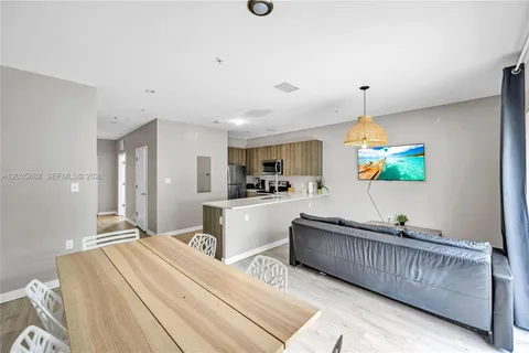 a view of a hallway with white walls