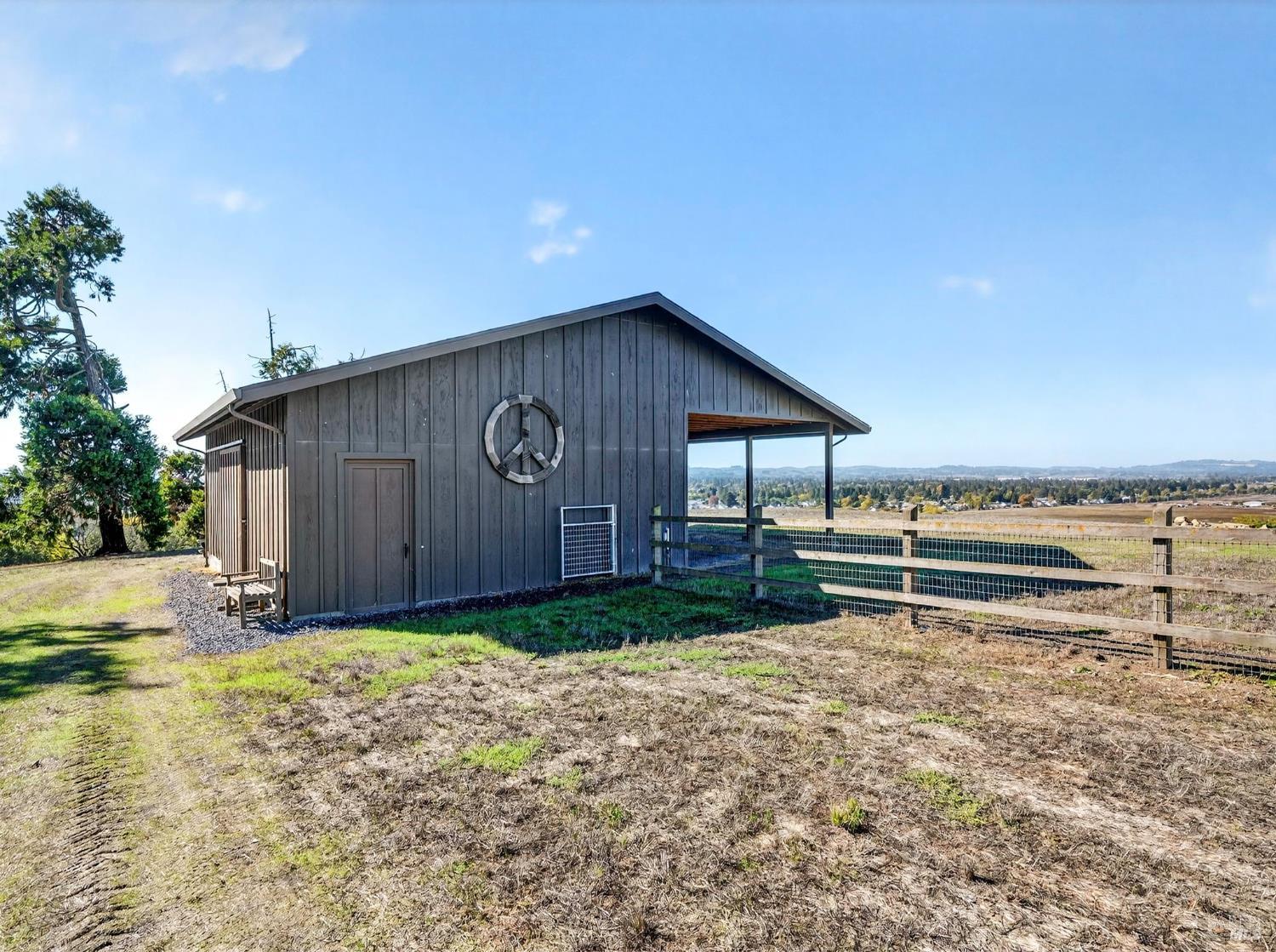 5200 Petaluma Hill Road Santa Rosa, CA 95404 - Photo 14 of 45 a wooden bench sitting in front of a house