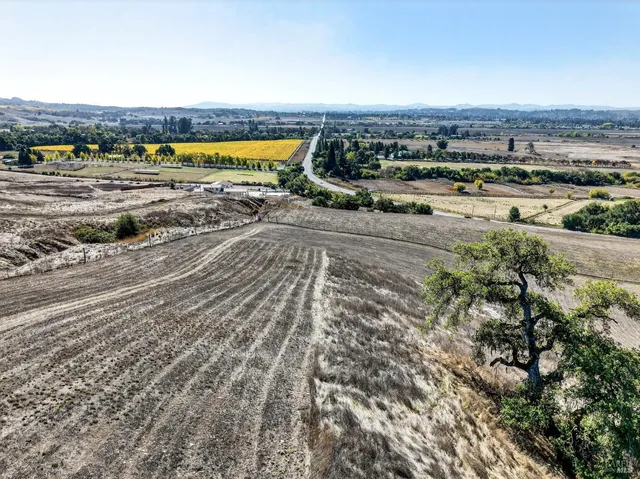 a view of a ocean with a mountain