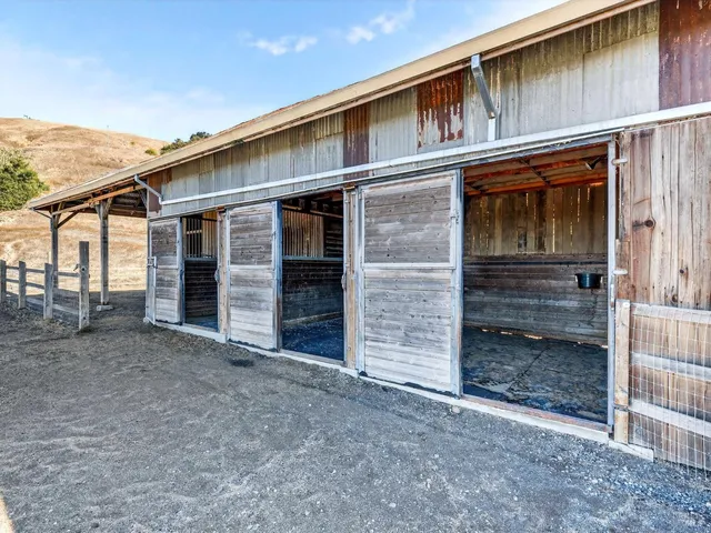 a view of outdoor space with trees all around