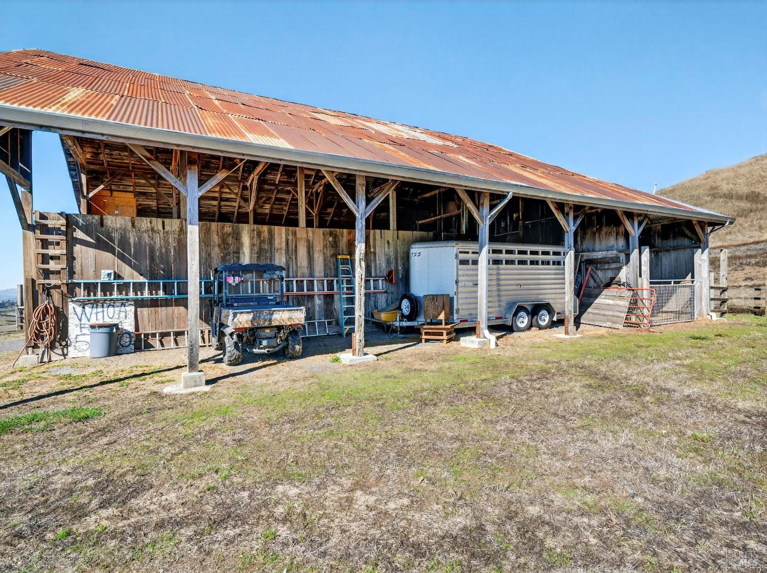 5200 Petaluma Hill Road Santa Rosa, CA 95404 - Photo 35 of 45 a view of a house with backyard porch and sitting area