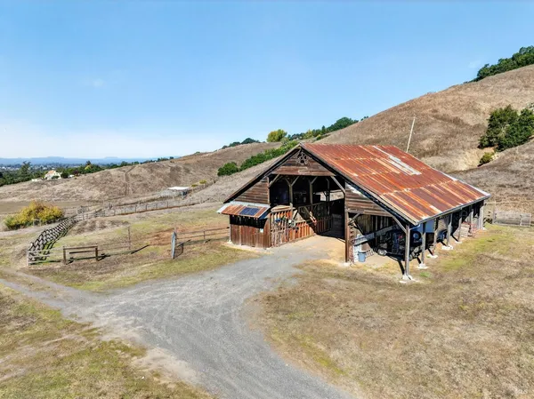 an aerial view of a chairs and table on the terrace