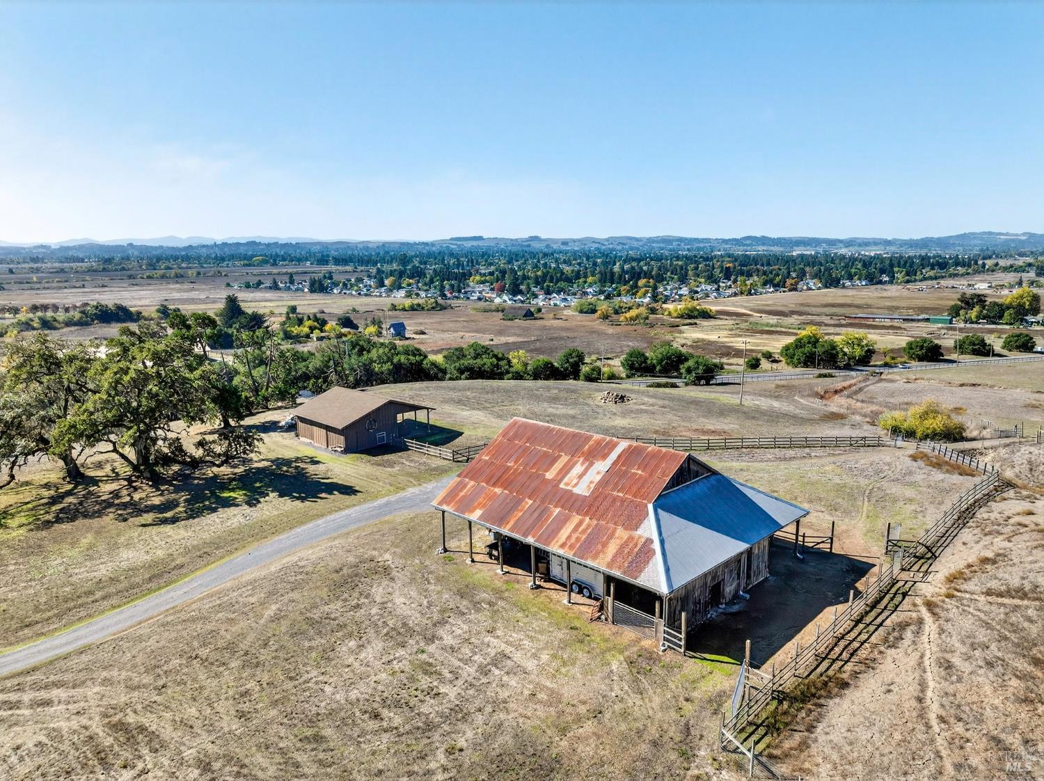 5200 Petaluma Hill Road Santa Rosa, CA 95404 - Photo 7 of 45 an aerial view of a chairs and table on the terrace