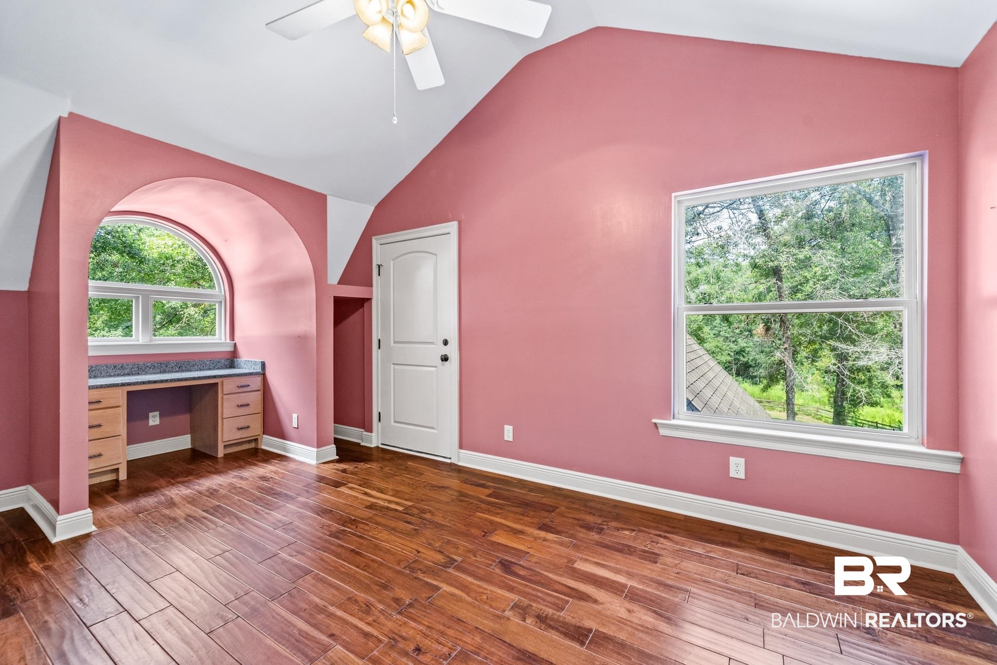 8321 Dixon Road Bay Minette, AL 36507 - Photo 52 of 79 Bonus room featuring ceiling fan, vaulted ceiling, and dark hardwood / wood-style flooring