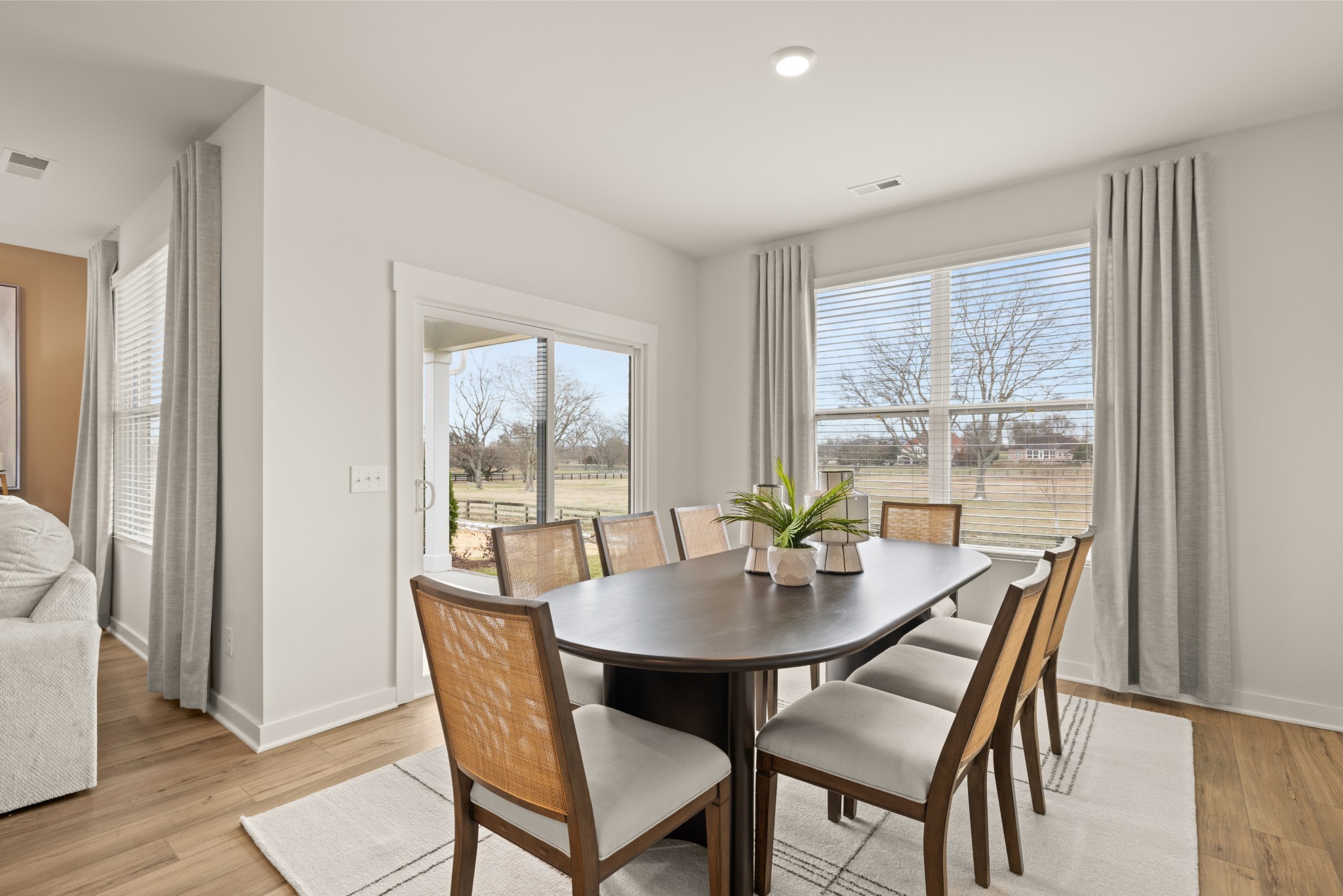 6352 North New Hope Road Hermitage, TN 37076 - Photo 16 of 52 a dining room with furniture window and wooden floor