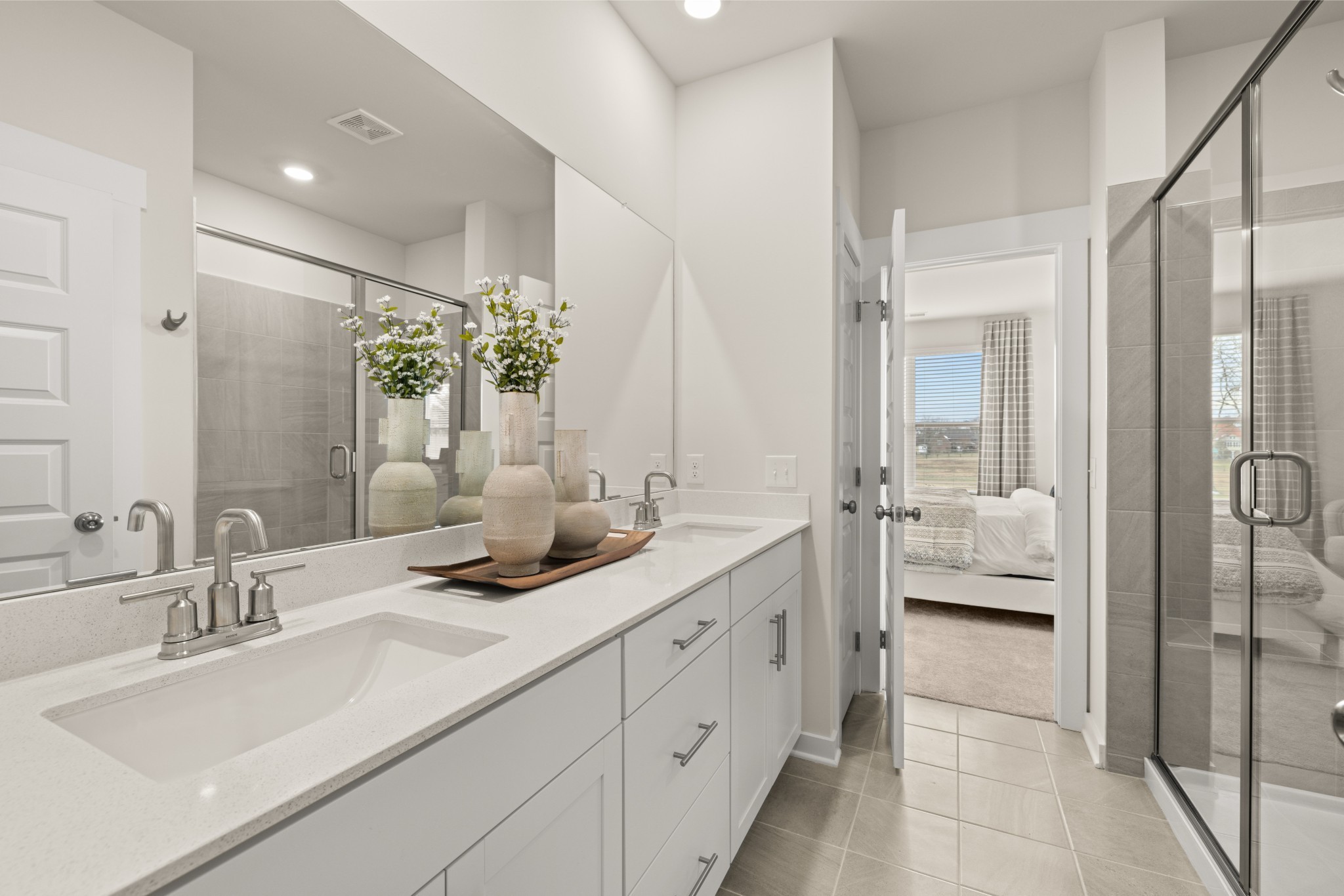 6352 North New Hope Road Hermitage, TN 37076 - Photo 29 of 52 a en suite bathroom with double sink and shower