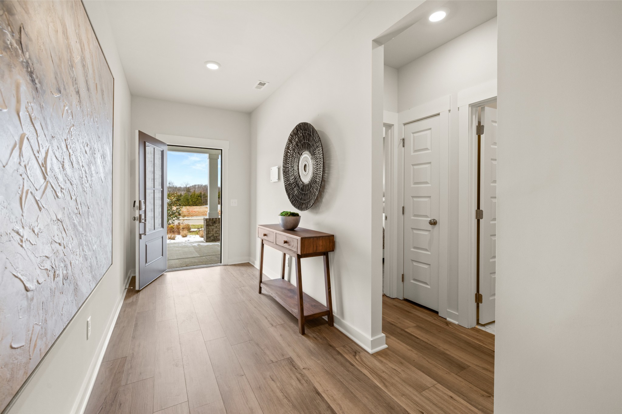 6352 North New Hope Road Hermitage, TN 37076 - Photo 3 of 52 a view of a room with wooden floor entryway and wooden floor