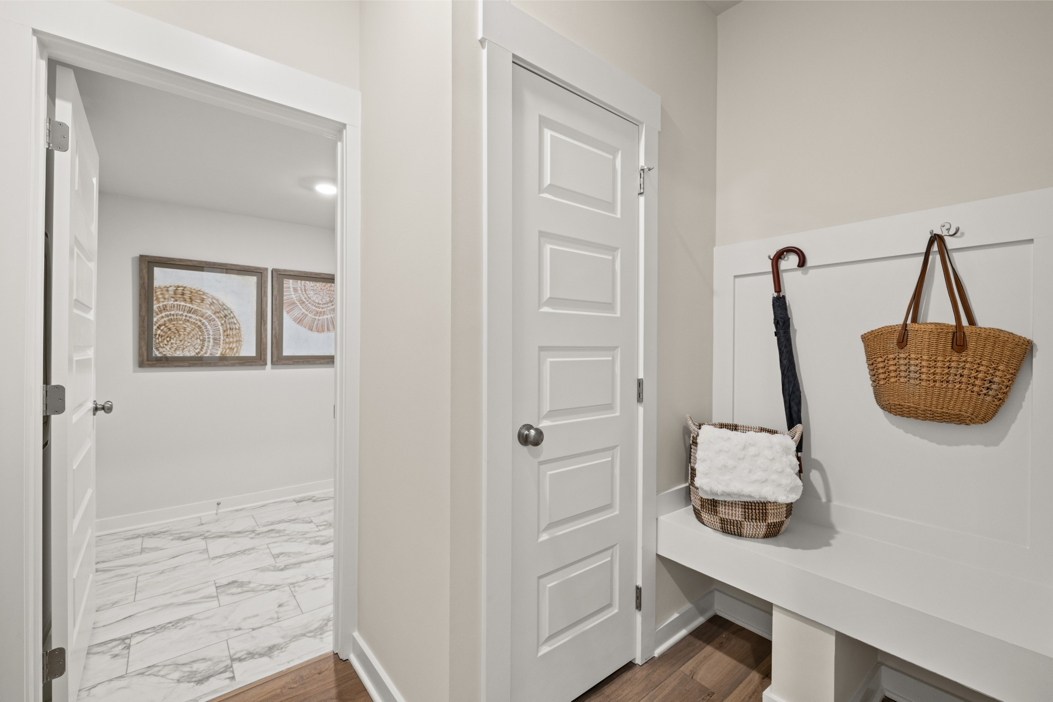 6352 North New Hope Road Hermitage, TN 37076 - Photo 4 of 52 a room with two chair and white wooden cabinets