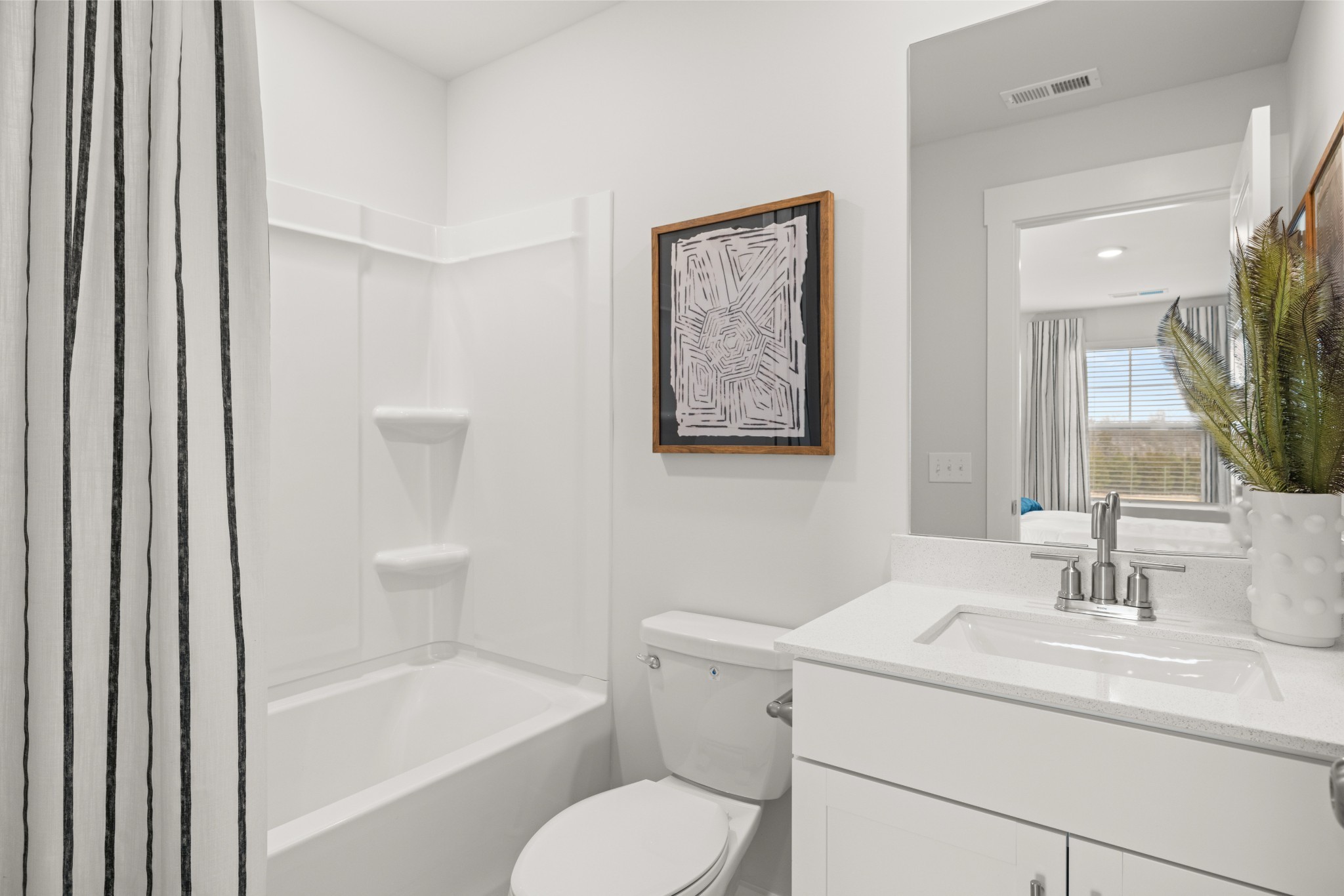 6352 North New Hope Road Hermitage, TN 37076 - Photo 43 of 52 a bathroom with a sink toilet and shower