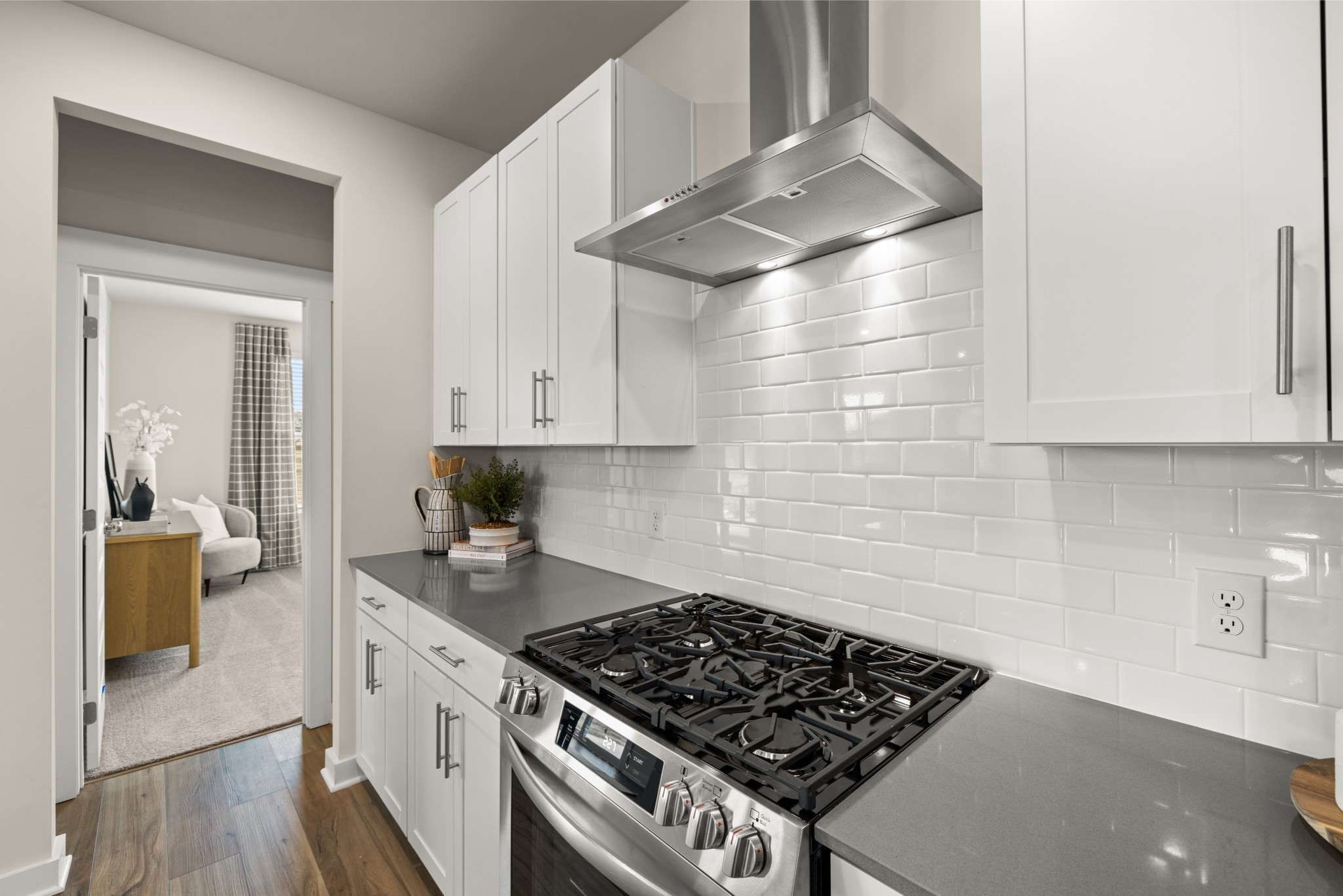 6352 North New Hope Road Hermitage, TN 37076 - Photo 10 of 52 a kitchen with stainless steel appliances granite countertop a stove and a sink