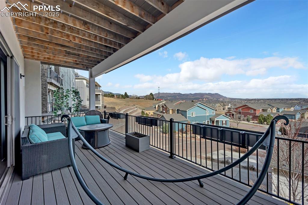 414 Eclipse Drive Colorado Springs, CO 80905 - Photo 40 of 50 Wooden terrace with a residential view and a mountain view