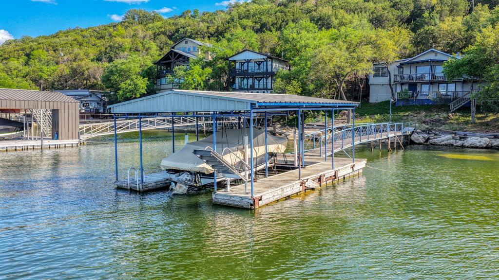 2181 Trail Ridge Road, Unit 2 Graford, TX 76449 - Photo 4 of 30 Dock with a water view and boat lift