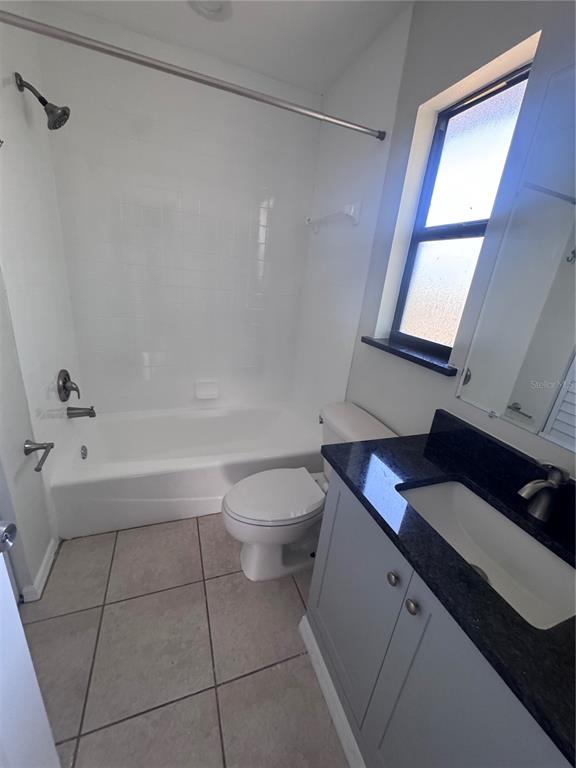 1755 Highland Road Osprey, FL 34229 - Photo 16 of 31 a bathroom with a sink a toilet and shower