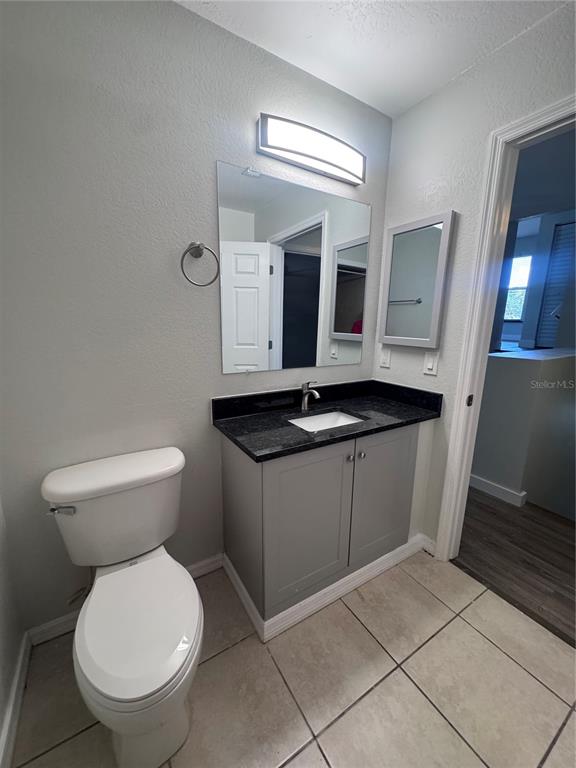 1755 Highland Road Osprey, FL 34229 - Photo 20 of 31 a bathroom with a toilet and a sink