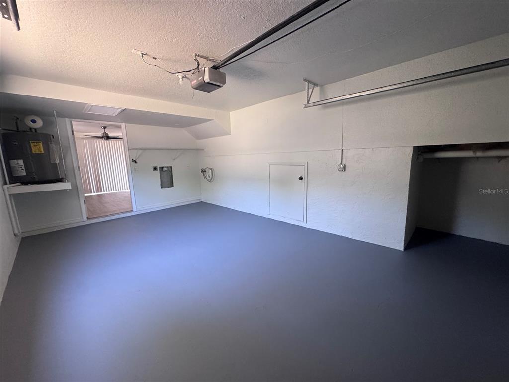 1755 Highland Road Osprey, FL 34229 - Photo 31 of 31 an empty room with windows and entrance