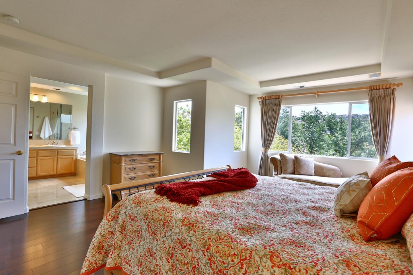 5806 Killarney Circle San Jose, CA 95138 - Photo 13 of 37 a bedroom with a bed and wooden floor