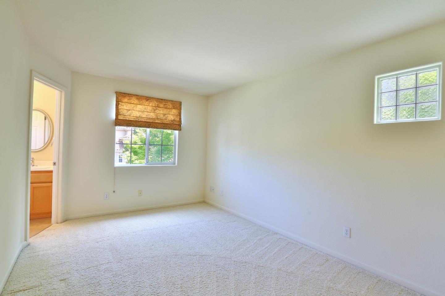 5806 Killarney Circle San Jose, CA 95138 - Photo 19 of 37 an empty room with windows