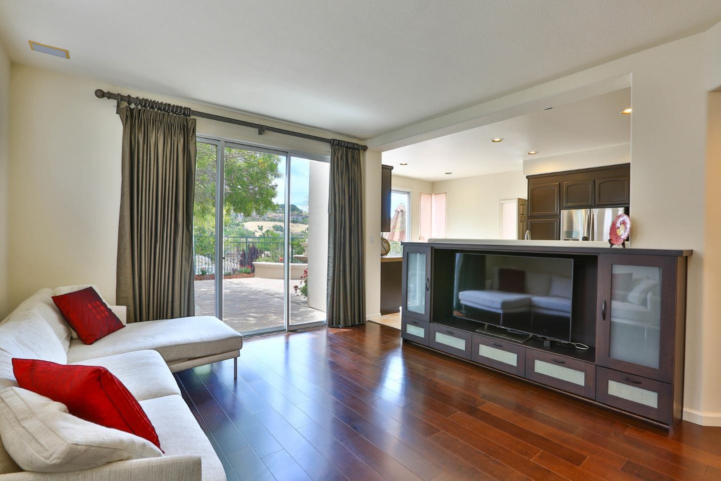 5806 Killarney Circle San Jose, CA 95138 - Photo 9 of 37 a living room with furniture fireplace and a flat screen tv