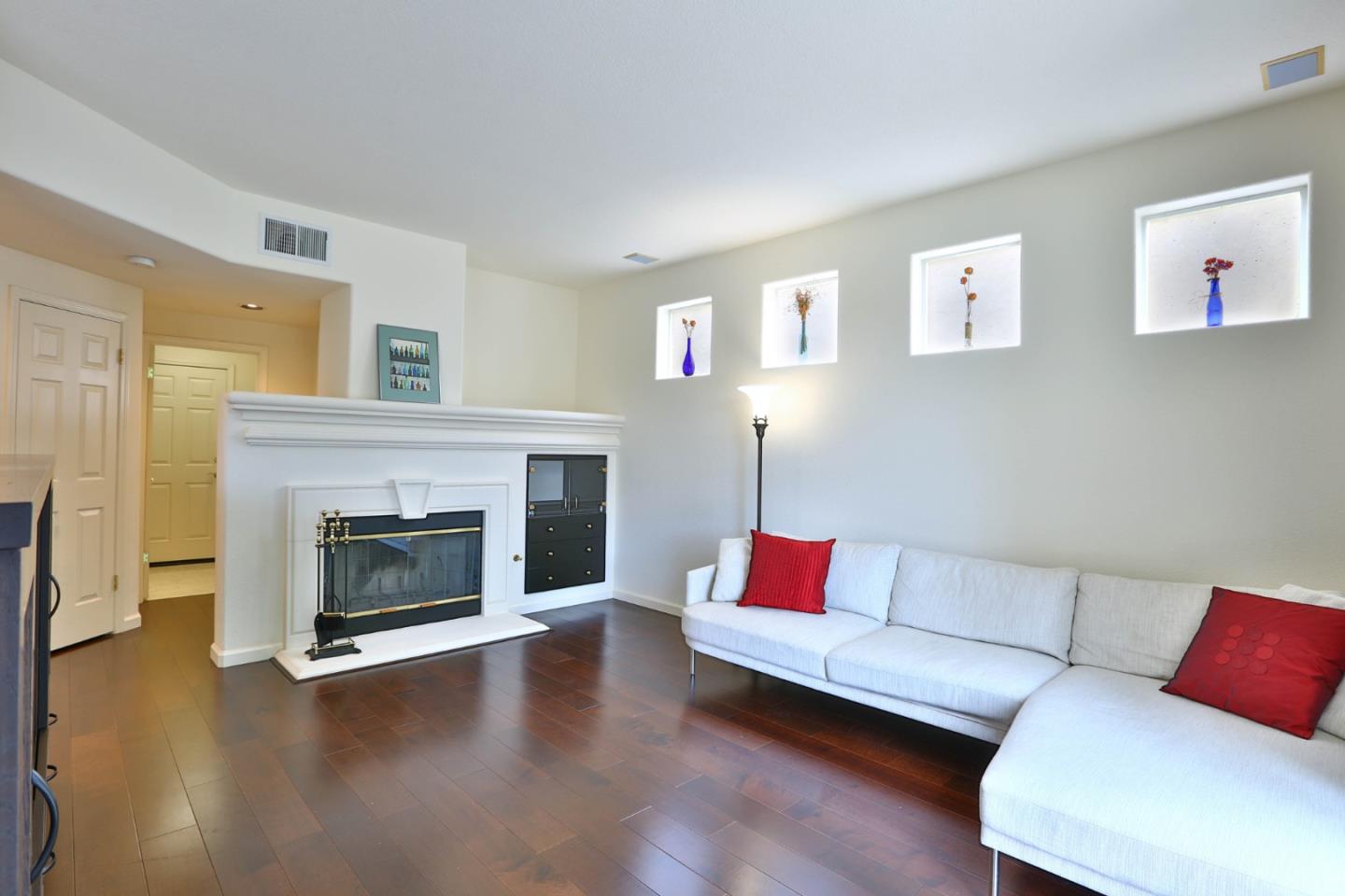 5806 Killarney Circle San Jose, CA 95138 - Photo 10 of 37 a living room with furniture and a fireplace