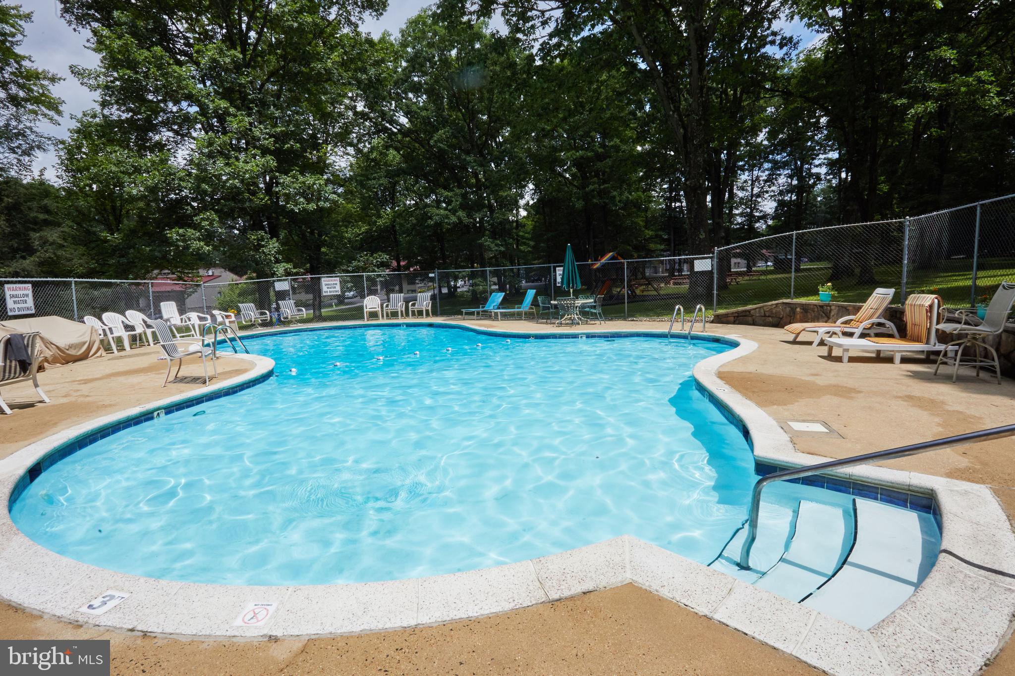 193 Red Run Road, Unit 1B3 Oakland, MD 21550 - Photo 53 of 57 Heated pool with changing rooms