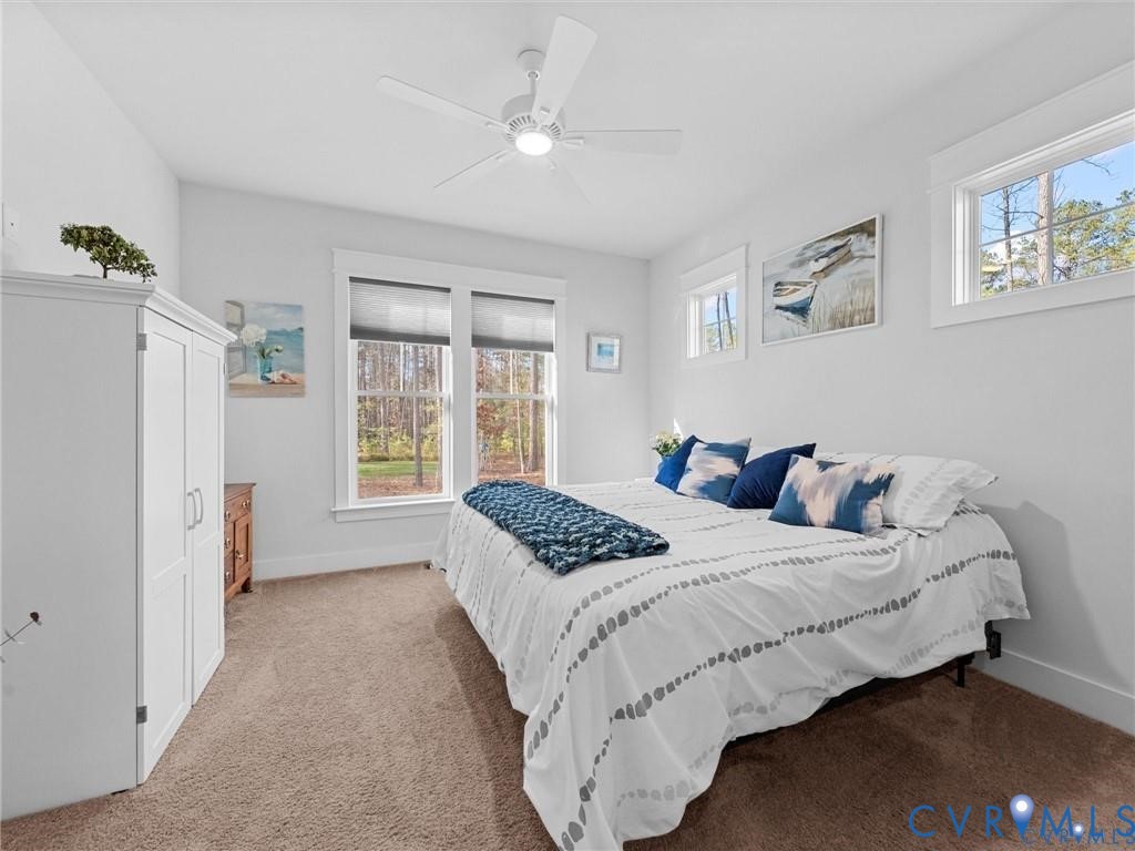 13406 Drake Mallard Court Chesterfield, VA 23838 - Photo 26 of 58 a bedroom with a bed and a window with the outer view