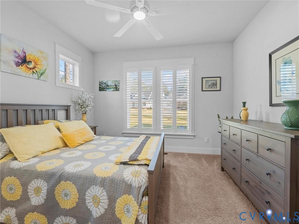 13406 Drake Mallard Court Chesterfield, VA 23838 - Photo 31 of 58 a bedroom with a bed and a window