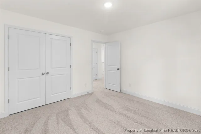 a view of a backyard with pathway