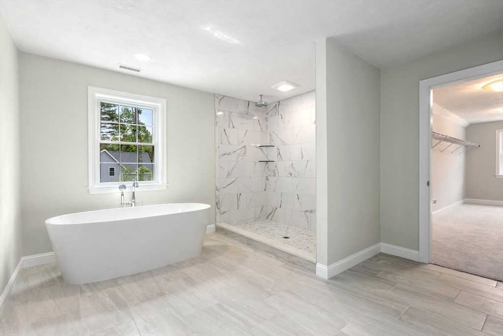 Lot 1 Quinn Road Marlborough, MA 01752 - Photo 19 of 26 a bathroom with a bathtub and shower