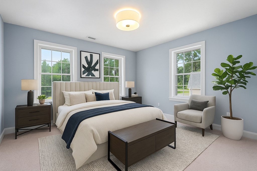 Lot 1 Quinn Road Marlborough, MA 01752 - Photo 22 of 26 a bedroom with bed and a couch