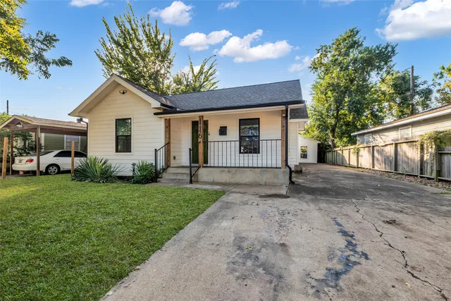 a house view with a garden space
