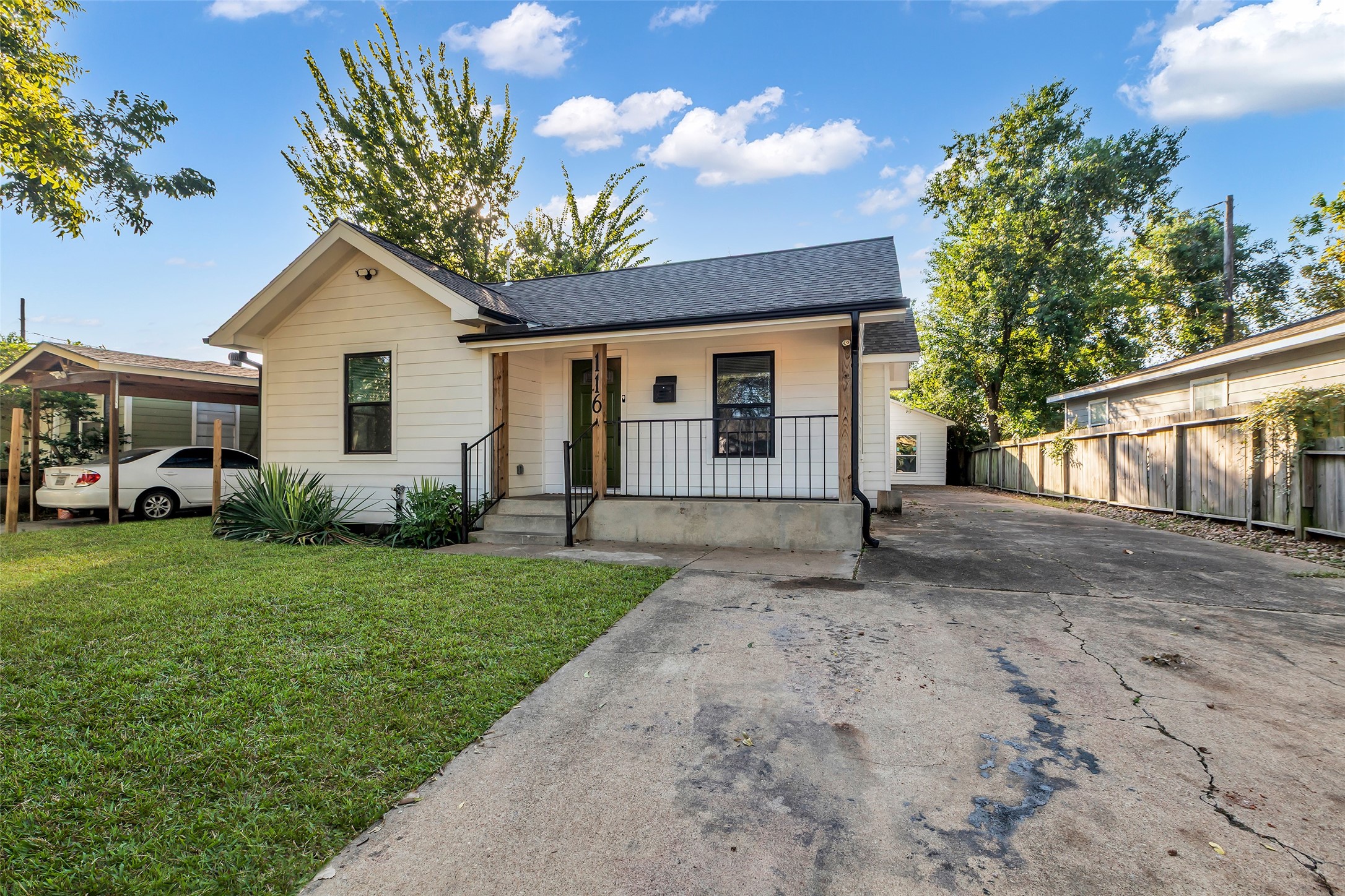 a house view with a garden space