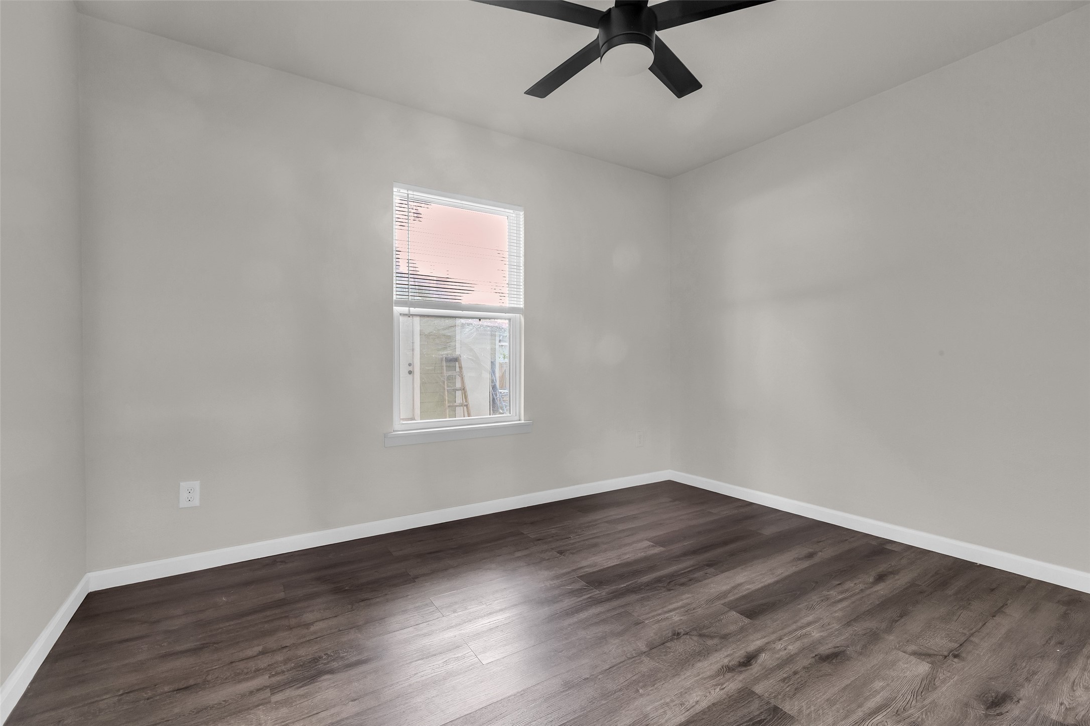 116 Gans Street Houston, TX 77029 - Photo 17 of 25 wooden floor in an empty room with a window