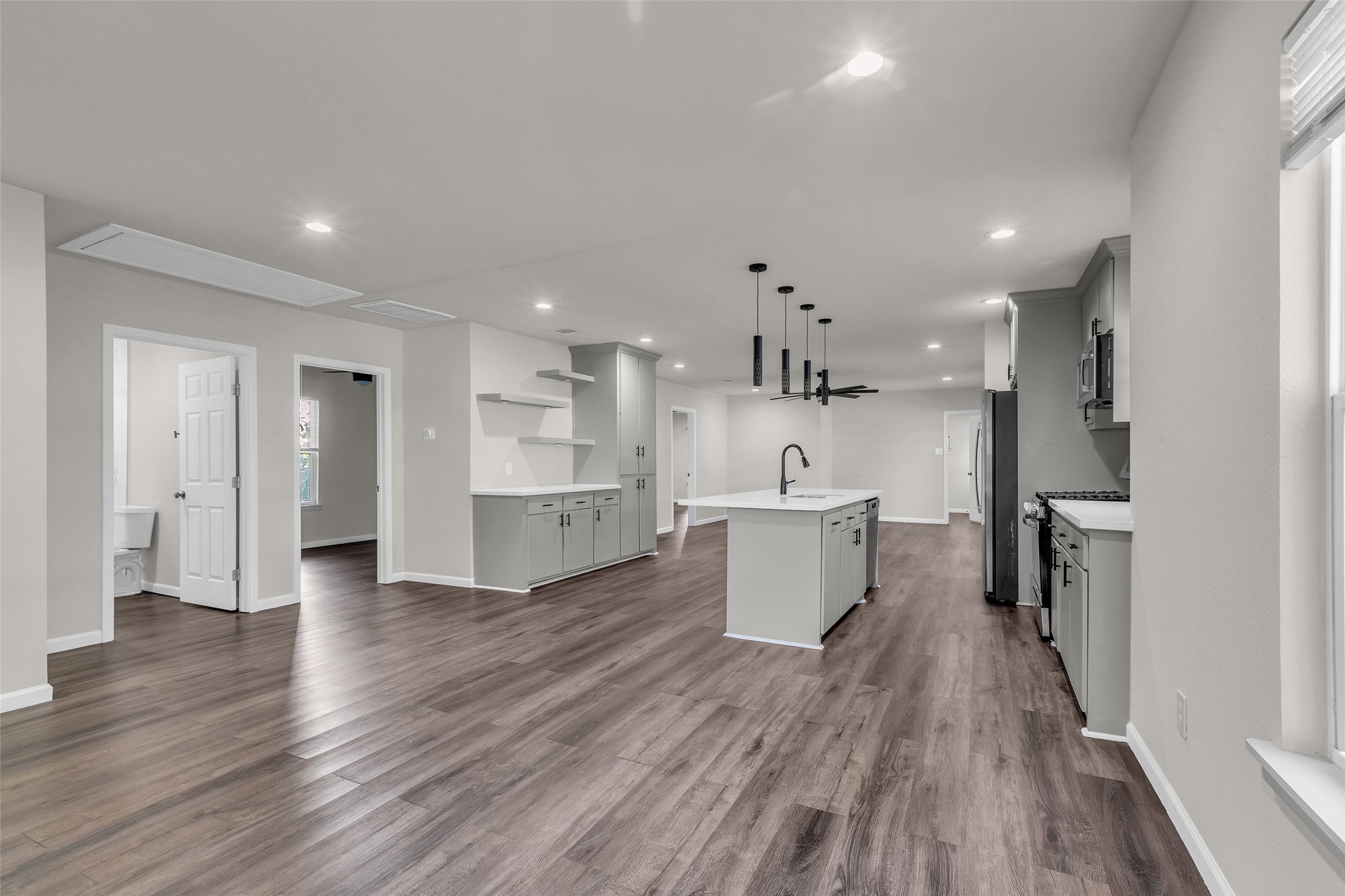 116 Gans Street Houston, TX 77029 - Photo 25 of 25 a large kitchen with a lot of counter space and a refrigerator