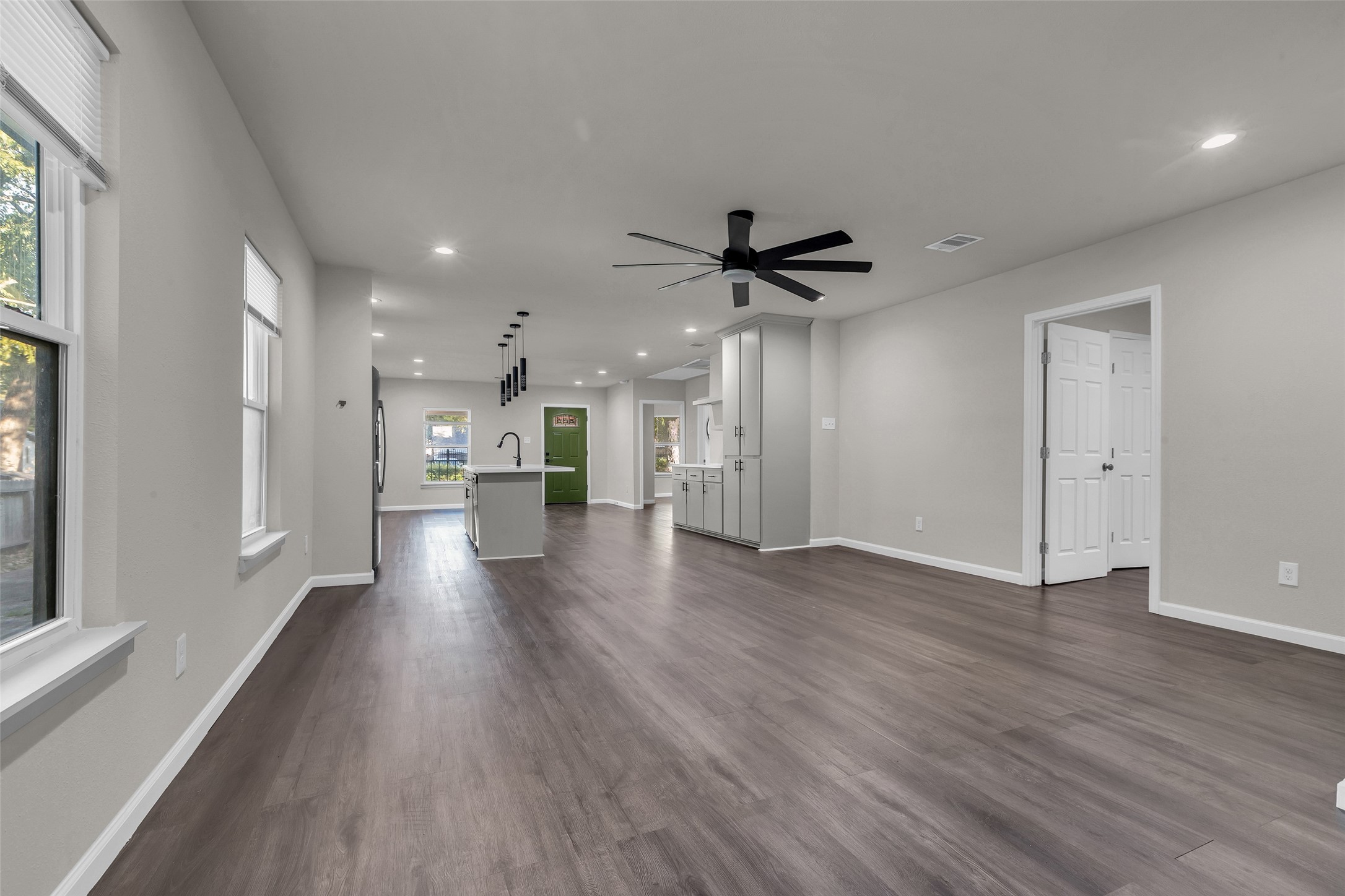 116 Gans Street Houston, TX 77029 - Photo 10 of 25 a view of a kitchen with a sink and a refrigerator