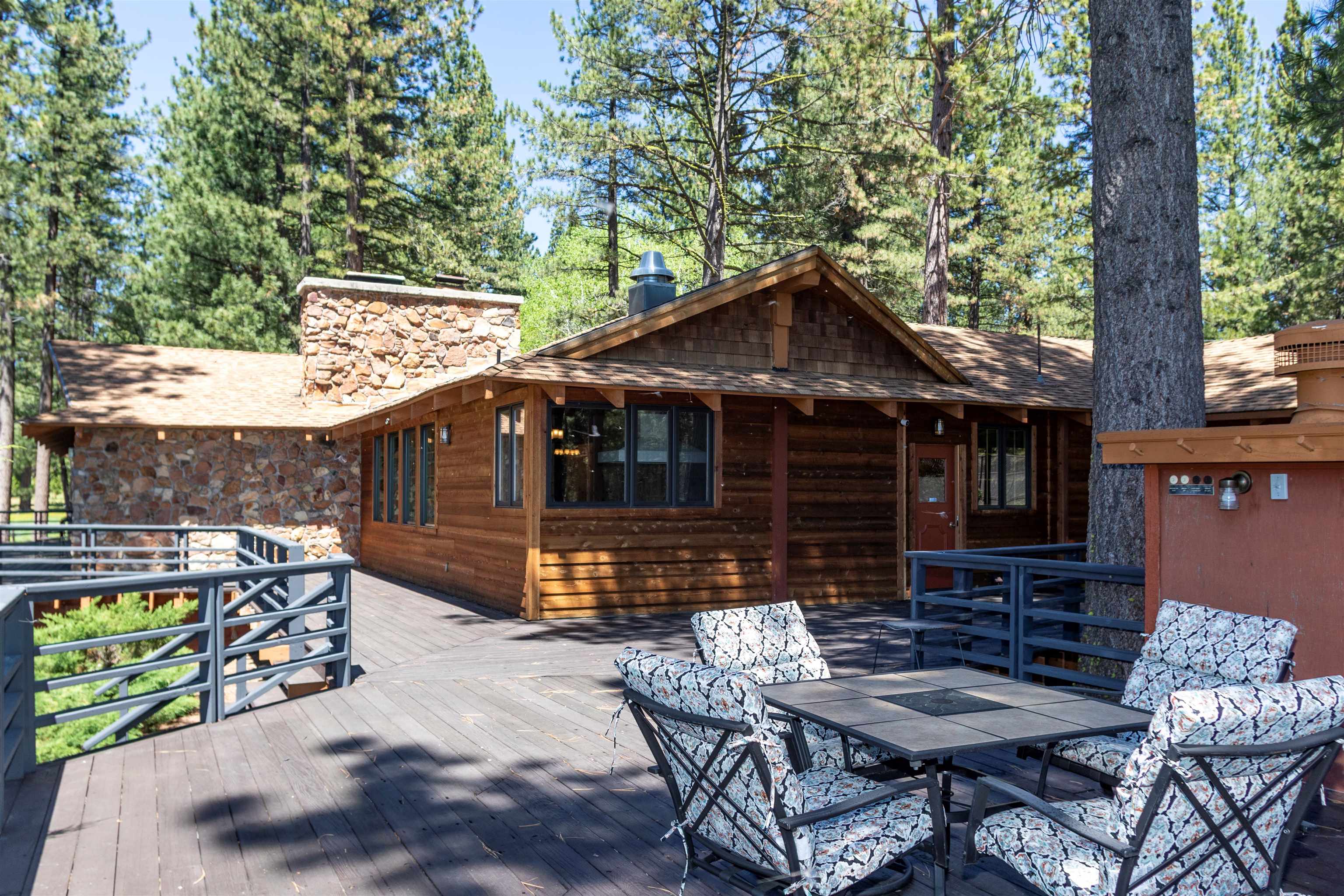 300 Meadow Ranch Road Calpine, CA 96124 - Photo 3 of 21 a view of a chair and table in backyard
