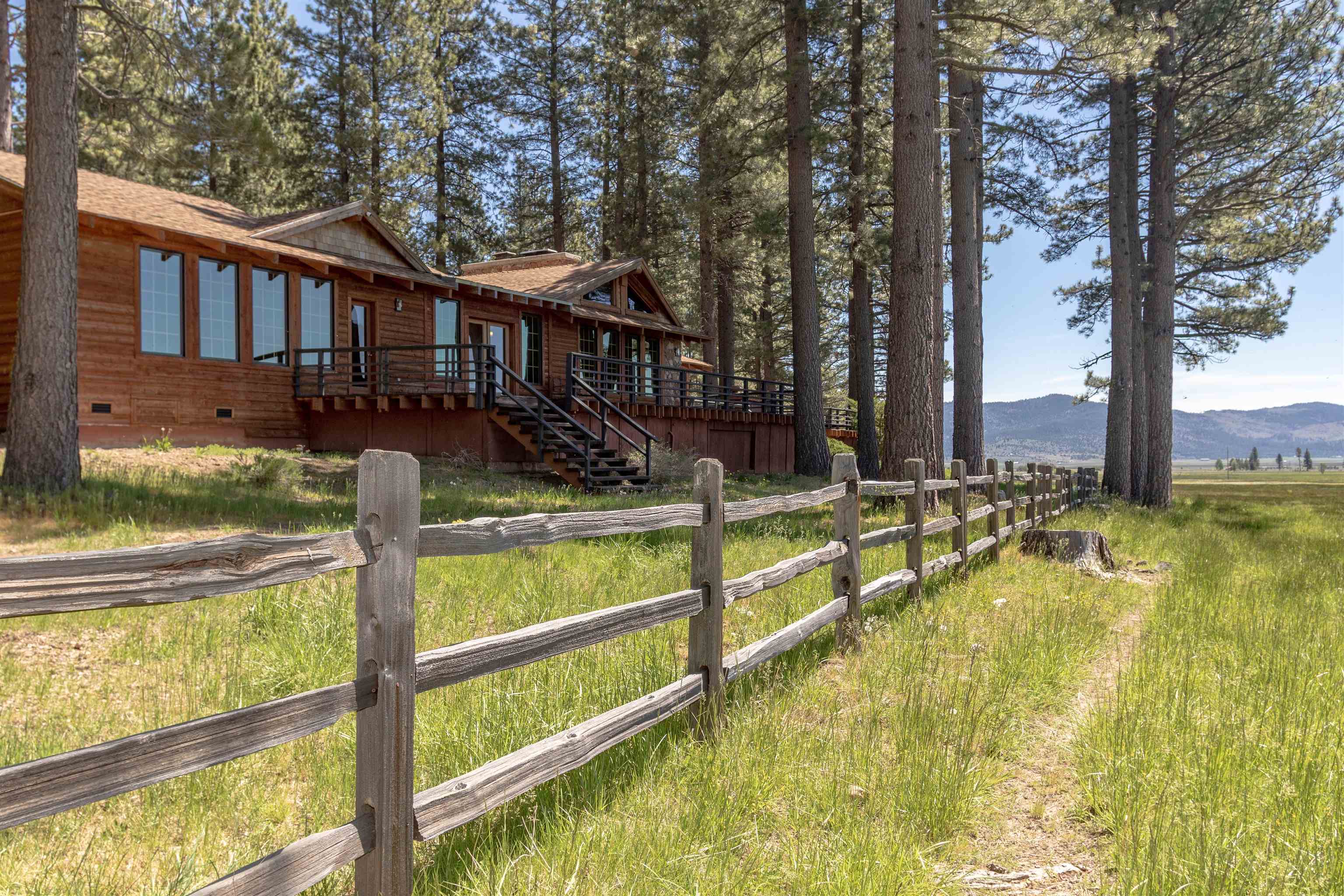 300 Meadow Ranch Road Calpine, CA 96124 - Photo 5 of 21 a view of a house with swimming pool and sitting area