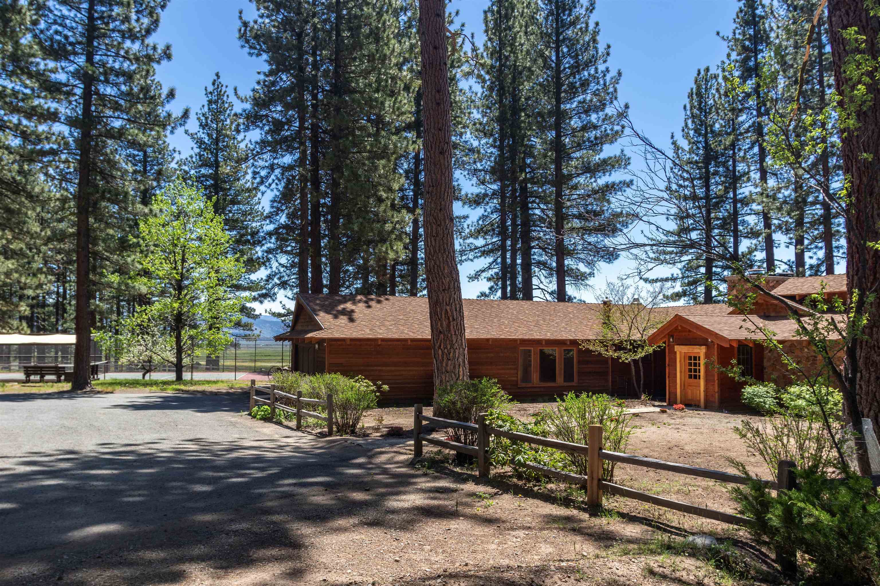 300 Meadow Ranch Road Calpine, CA 96124 - Photo 8 of 21 a front view of a house with a yard