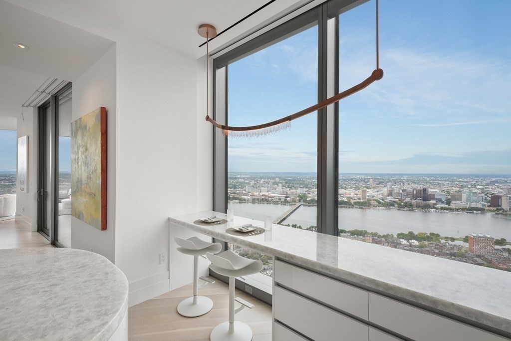 1 Dalton Street, Unit 5801/5802 Boston, MA 02115 - Photo 17 of 28 a room with furniture and window