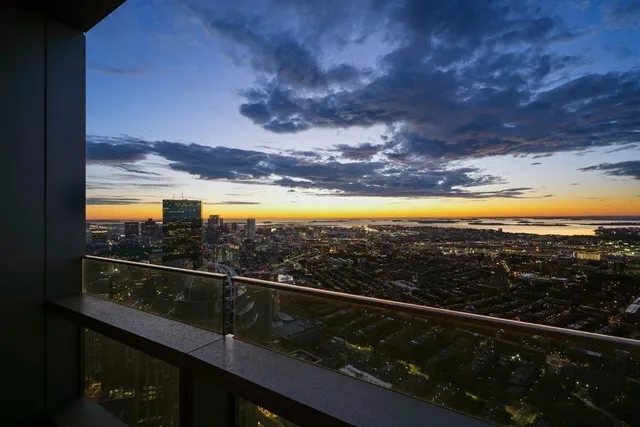 a view of a balcony with an outdoor space